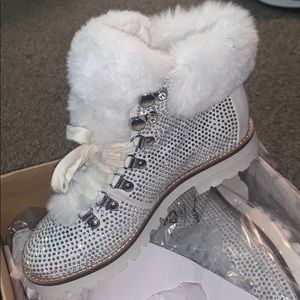 Size 7 women’s bling white boots.  Never used.